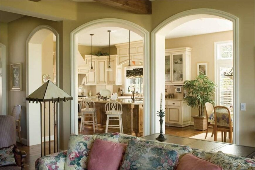 View of the kitchen from the living room showing the open arches.