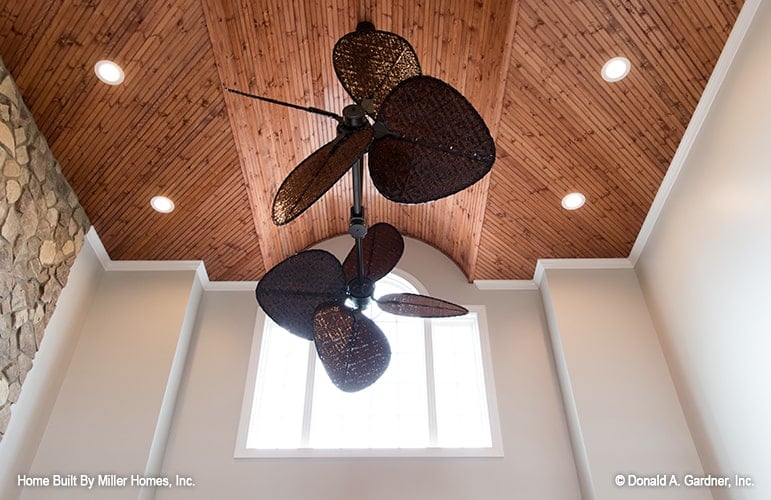 Great room with Palladian window and a barrel-vaulted ceiling.