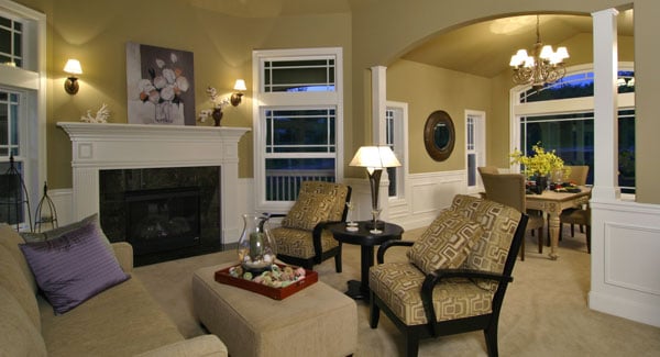 You'll see the dining room on the right side framed with an open archway.
