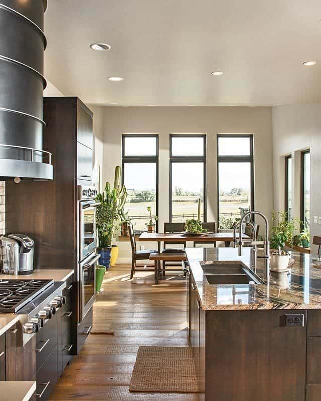 A closer look shows the wooden front door surrounded by frosted glass panels.
