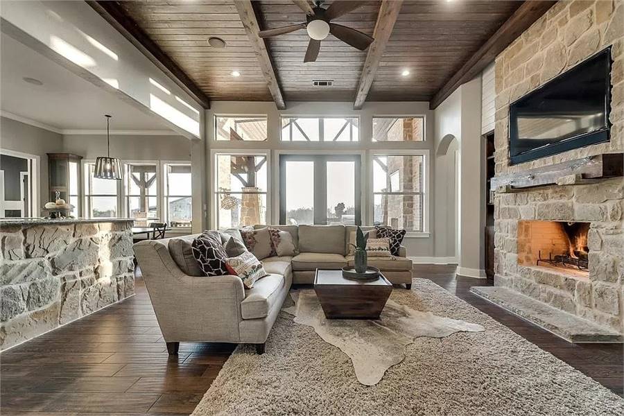 Inviting Living Room with Stone Fireplace