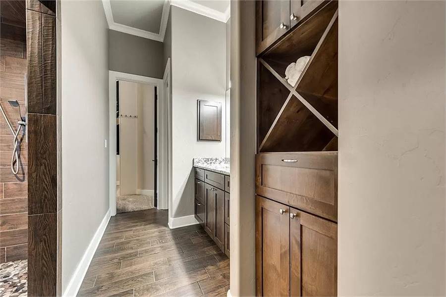 Elegant Hallway Leading to a Modern Bathroom