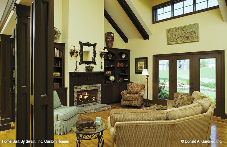 Clerestory windows on the right side flood the living room with abundant natural light.