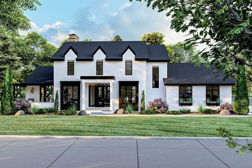 Front exterior view with white stucco siding, triple dormers, and a sleek covered porch.