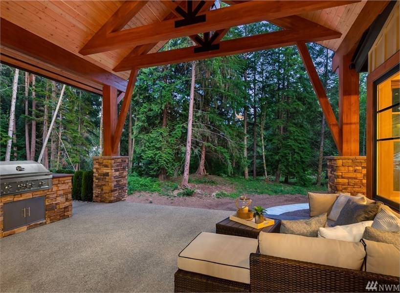 A summer kitchen across provides great outdoor entertaining.