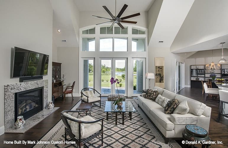 The white french door on the side leads out to the covered back porch.