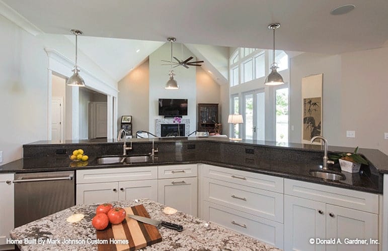 View of the soaring living room from the gourmet kitchen.