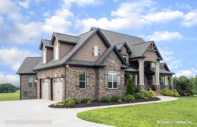 Stylish Stone and Wood Exterior with Dormer Accents
