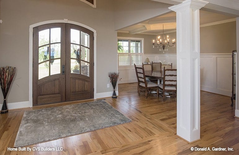 Sunlit Entryway with Elegant Dining Accents