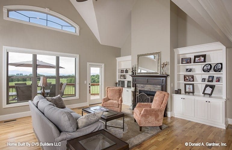 Expansive Living Room with Vaulted Ceilings and Scenic Views