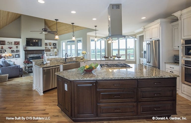 Expansive Kitchen and Living Area with Granite Island