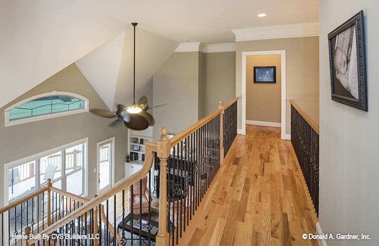 Upper Hallway Overlooking Living Area with Art Accent