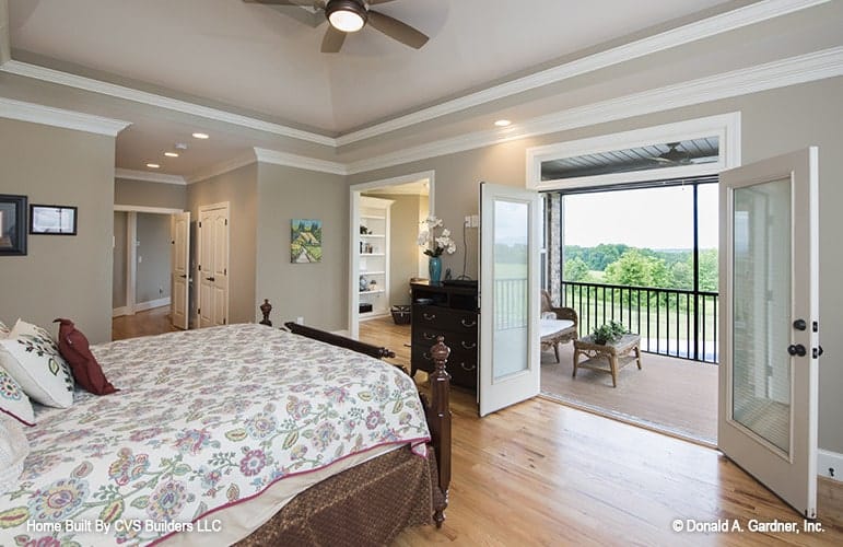 Elegant Bedroom with French Doors and Balcony View