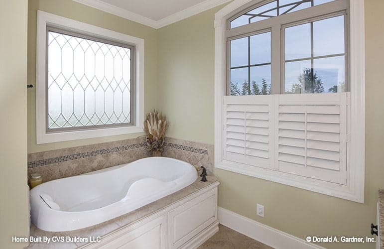 Bright Bathroom with Elegant Bathtub and Natural Light