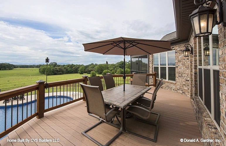 Expansive Deck with Sweeping Views and Poolside Leisure