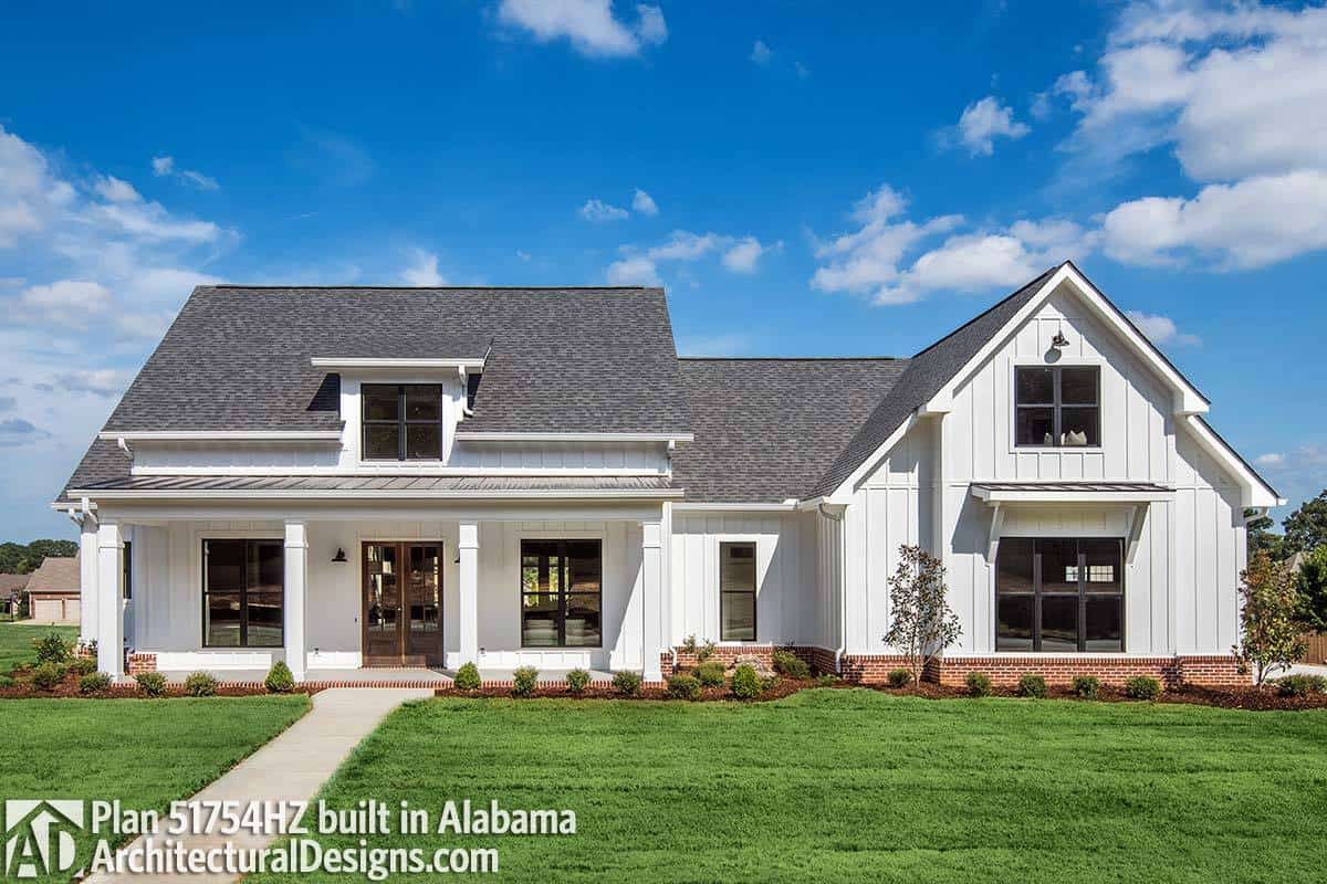 A front exterior alternative with brick bases and white columns.