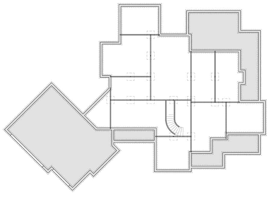 Unfinished basement layout showing the future spaces and staircase leading to the main floor.