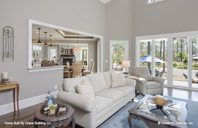 The living room opens to the kitchen and onto the family room.