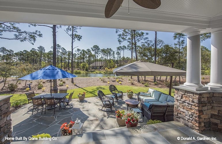 Open patio with plenty of outdoor seats and decorative potted plants.