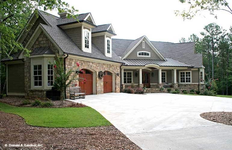 Distinctive Multi-Gabled Roof Design with Stone and Wood Siding