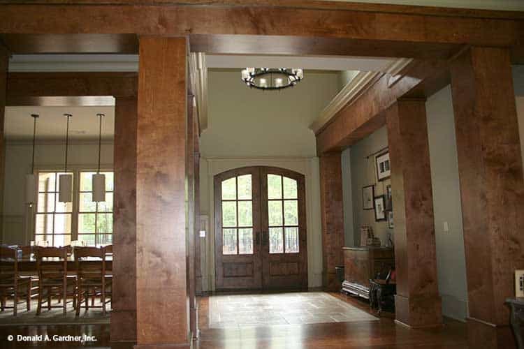 Warm Wooden Entryway Enhances Open-Plan Living Experience