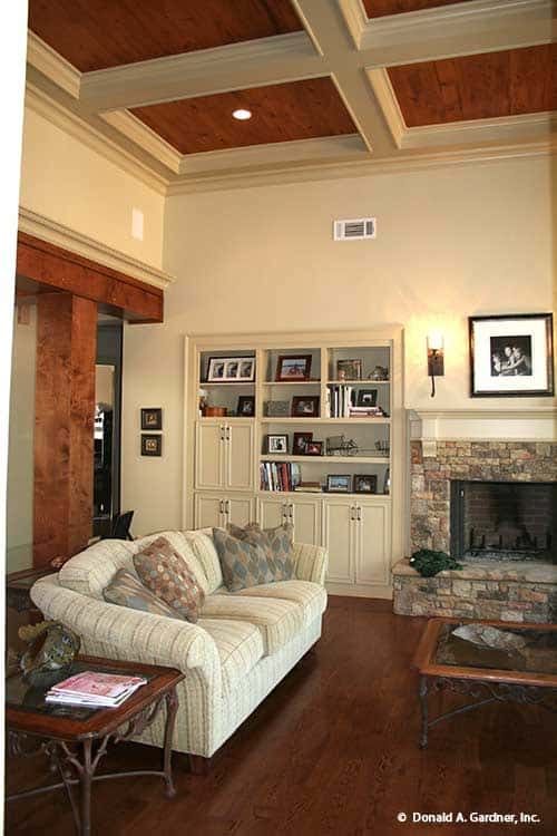 Elegant Living Room with Wooden Accents and High Ceilings