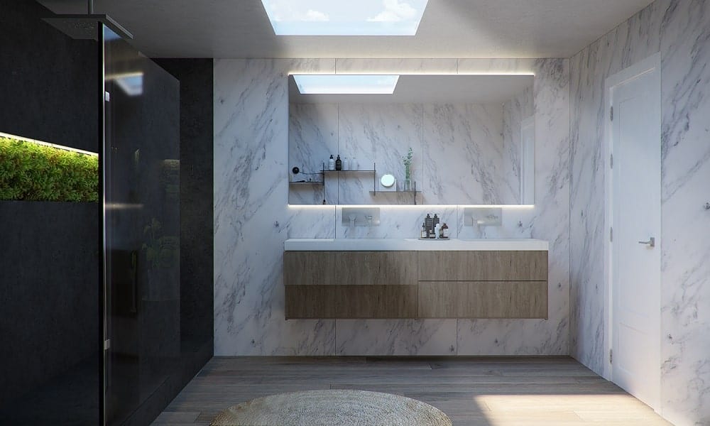 Across from the bathtub is a floating wooden vanity with drawers that stands out against the white marble wall.