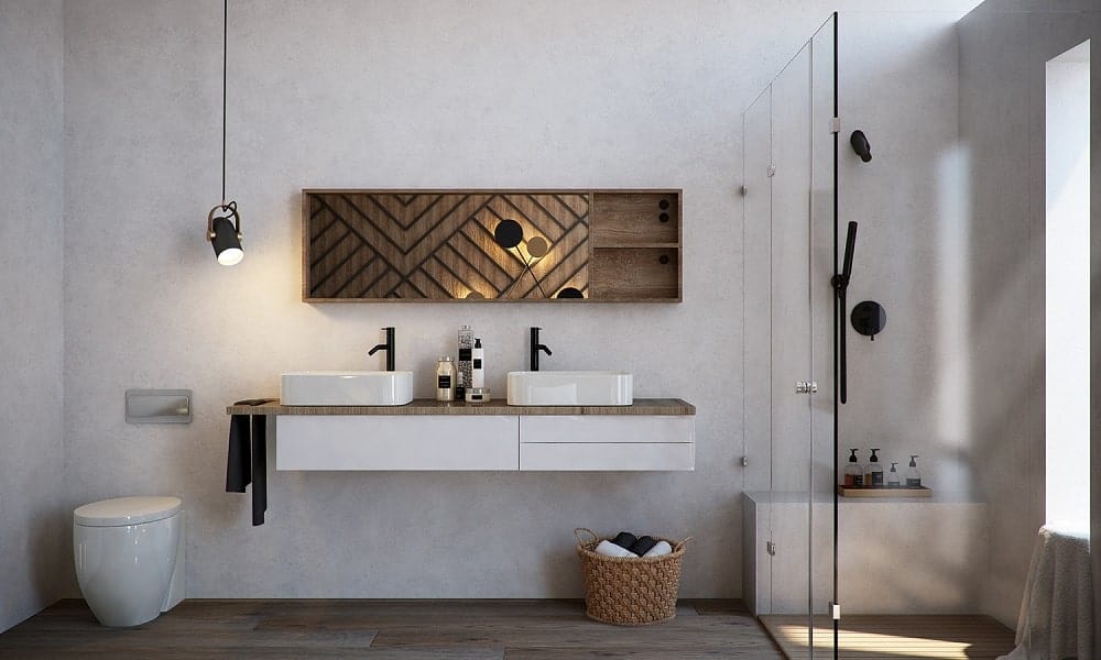 This simple bathroom has white tones on its walls and floating vanity with two freestanding sinks beside the glass-enclosed shower area with dark fixtures.