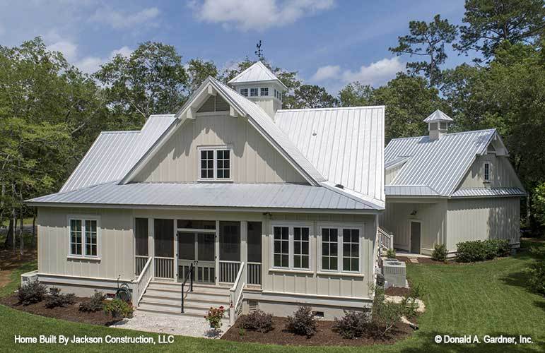 Rear exterior view showing the patio and screened porch complemented with a stoop.