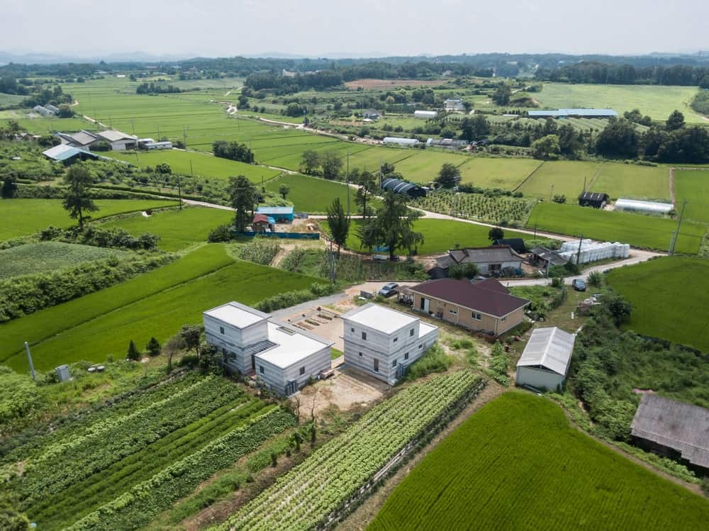 This is an aerial view of the house showcasing the lush landscape that surrounds it.