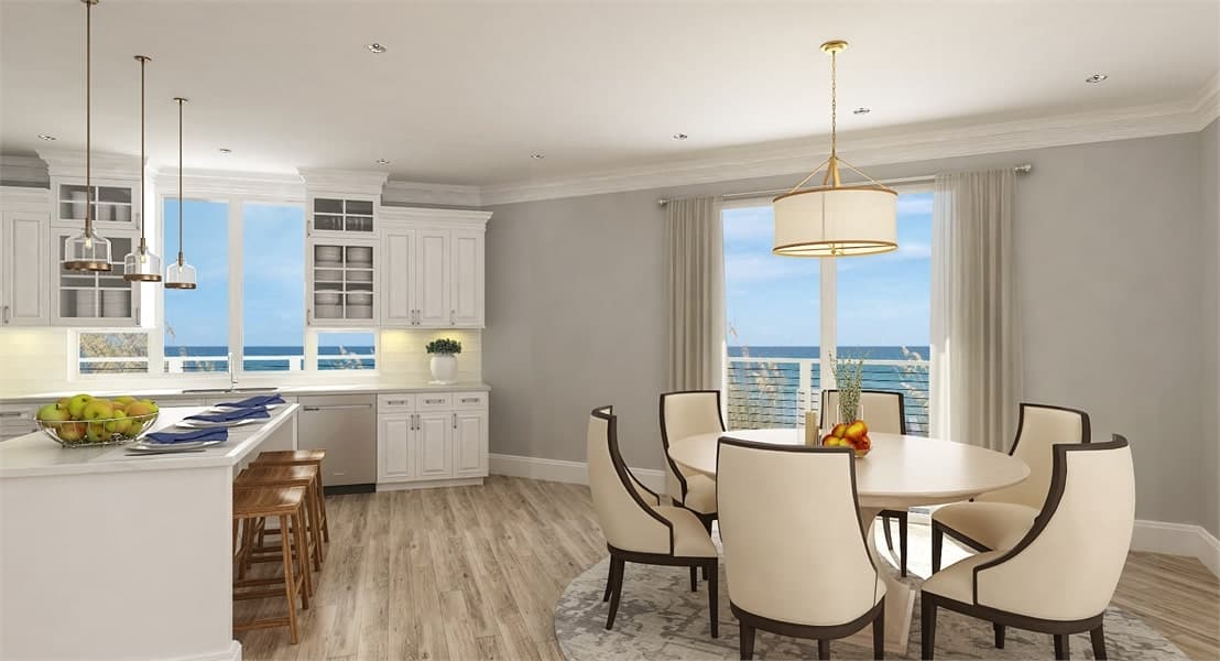 Dining area with beige cushioned chairs and a round dining table illuminated by a drum chandelier.