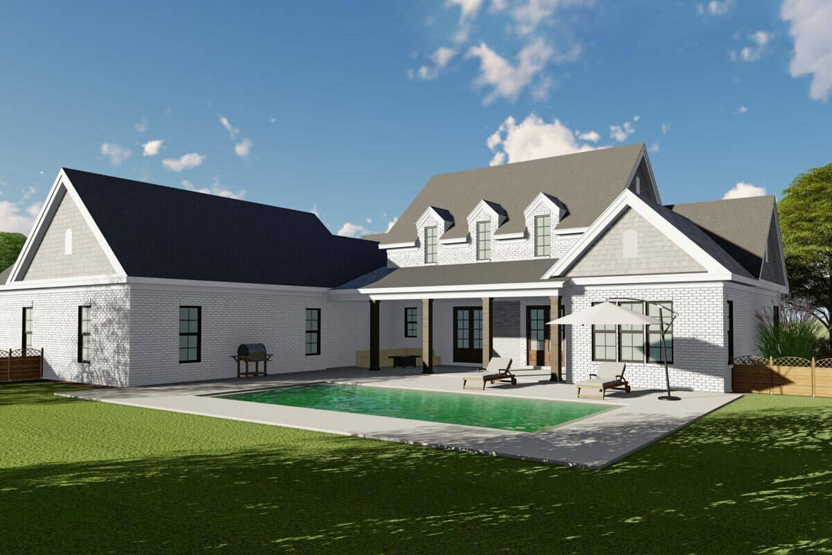 Rear rendering of the two-story 4-bedroom brick-clad traditional home.