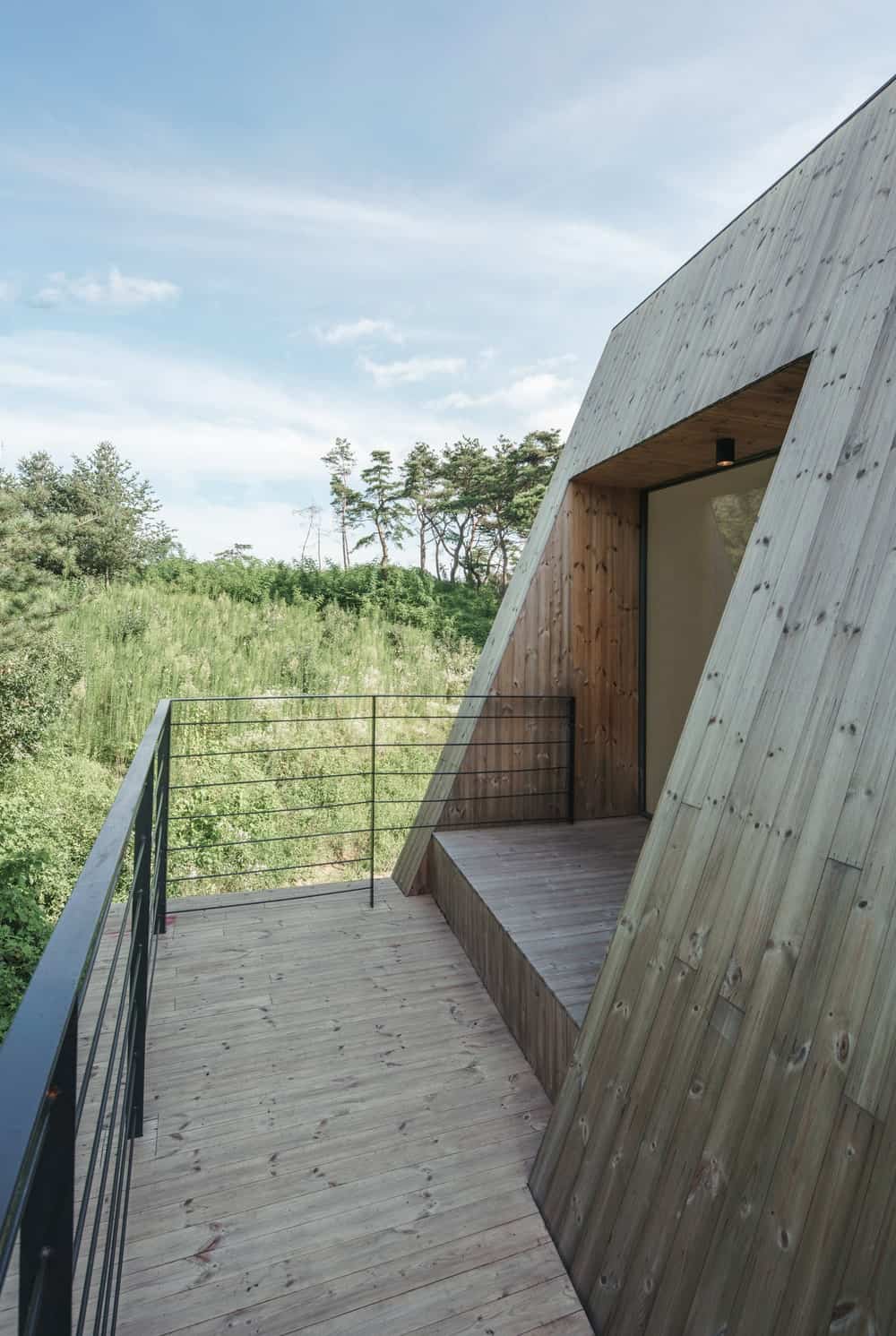 This is another look at the balcony of the house showcasing the balcony door.
