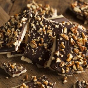 A close look at homemade English toffee with nuts.