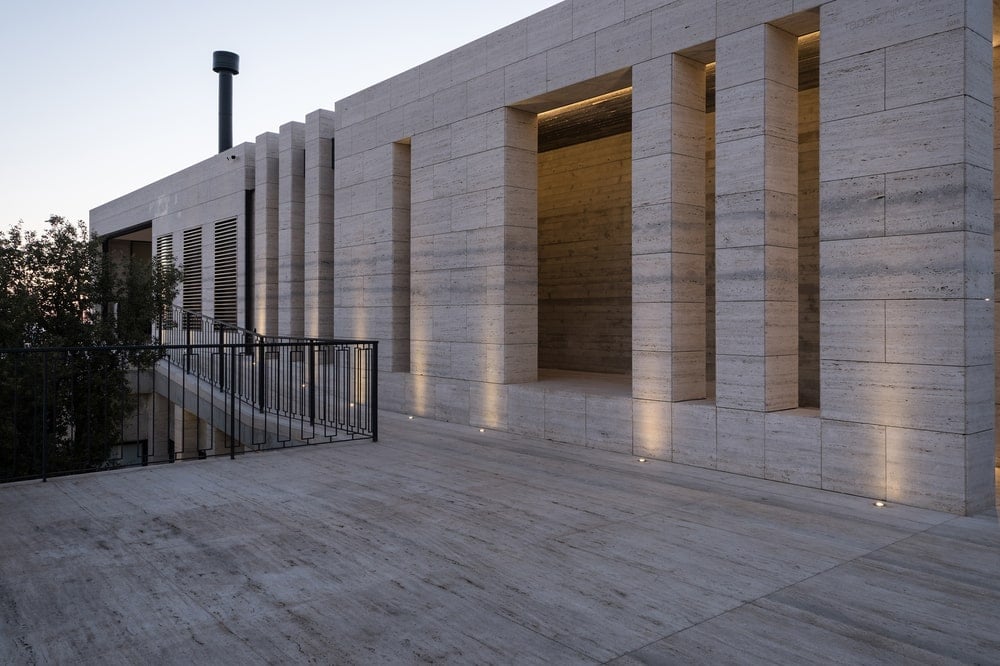 This is a close look at the balcony and the outdoor lights recessed on its floor.