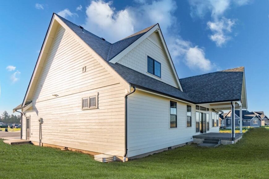 Rear exterior view showing the covered porch topped with a vaulted gable.