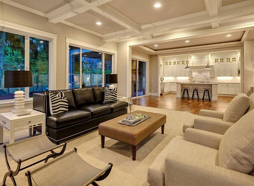 The living room has a great sightline of the open kitchen.