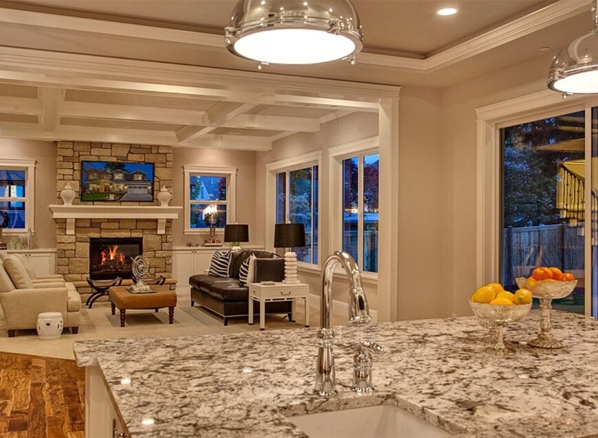 View of the coffered living room from the kitchen.