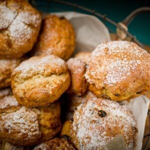 A basket full of ginger and pear scones.