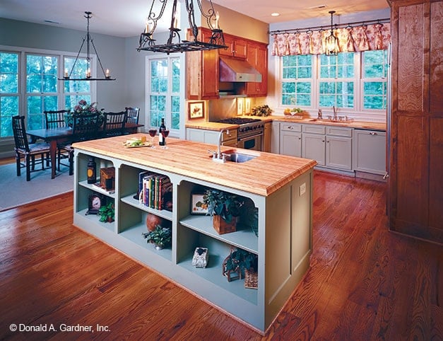 Across the kitchen is the dining area with a rectangular dining set.Across the kitchen is the dining area with a rectangular dining set.