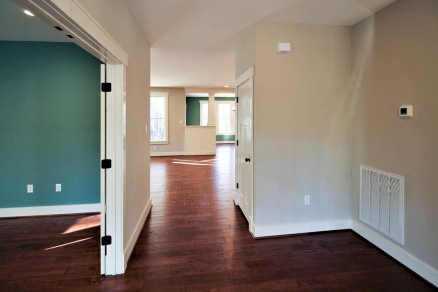 The foyer opens to the home office and living room.