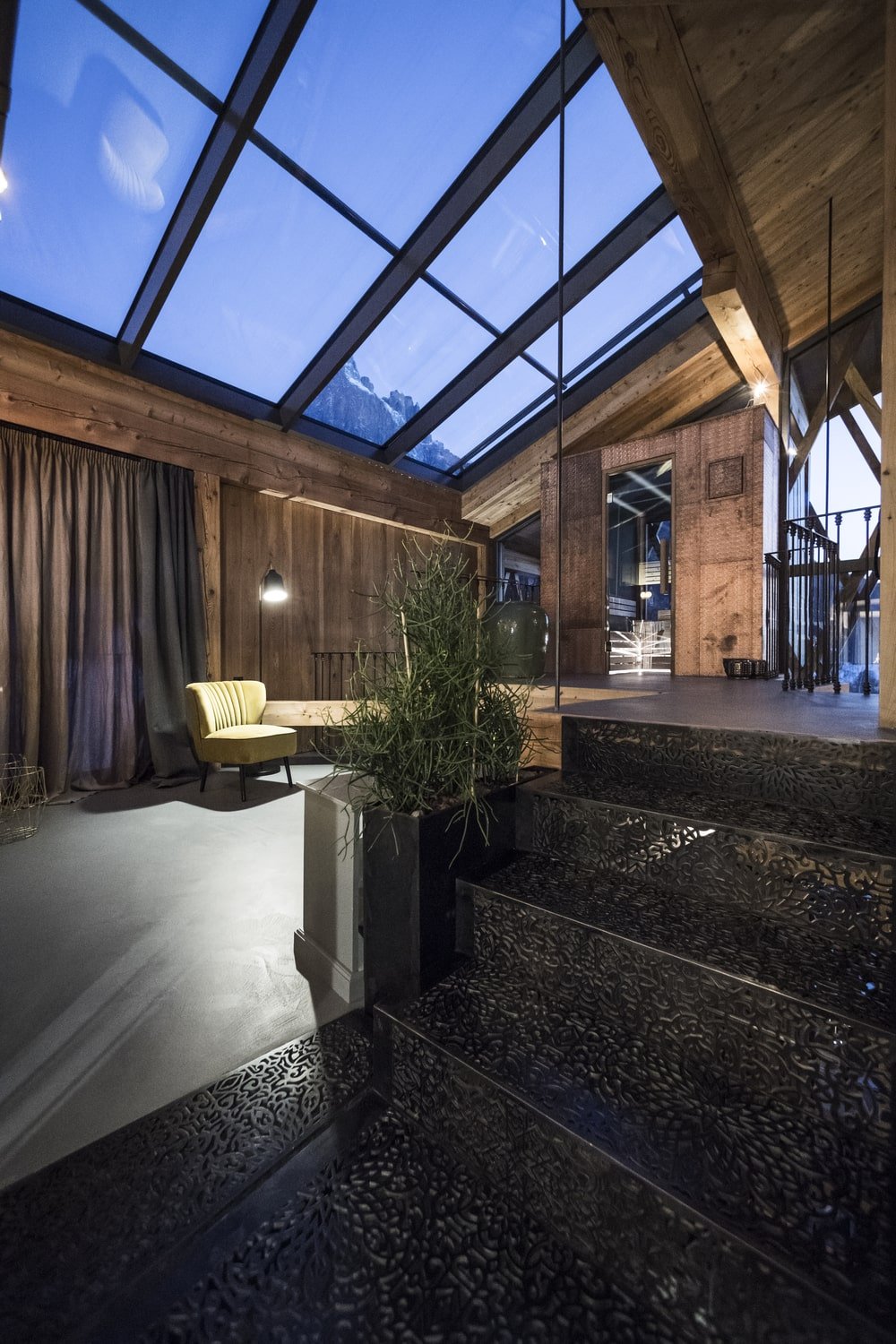 This is a view of the top floor that has a large glass skylight.