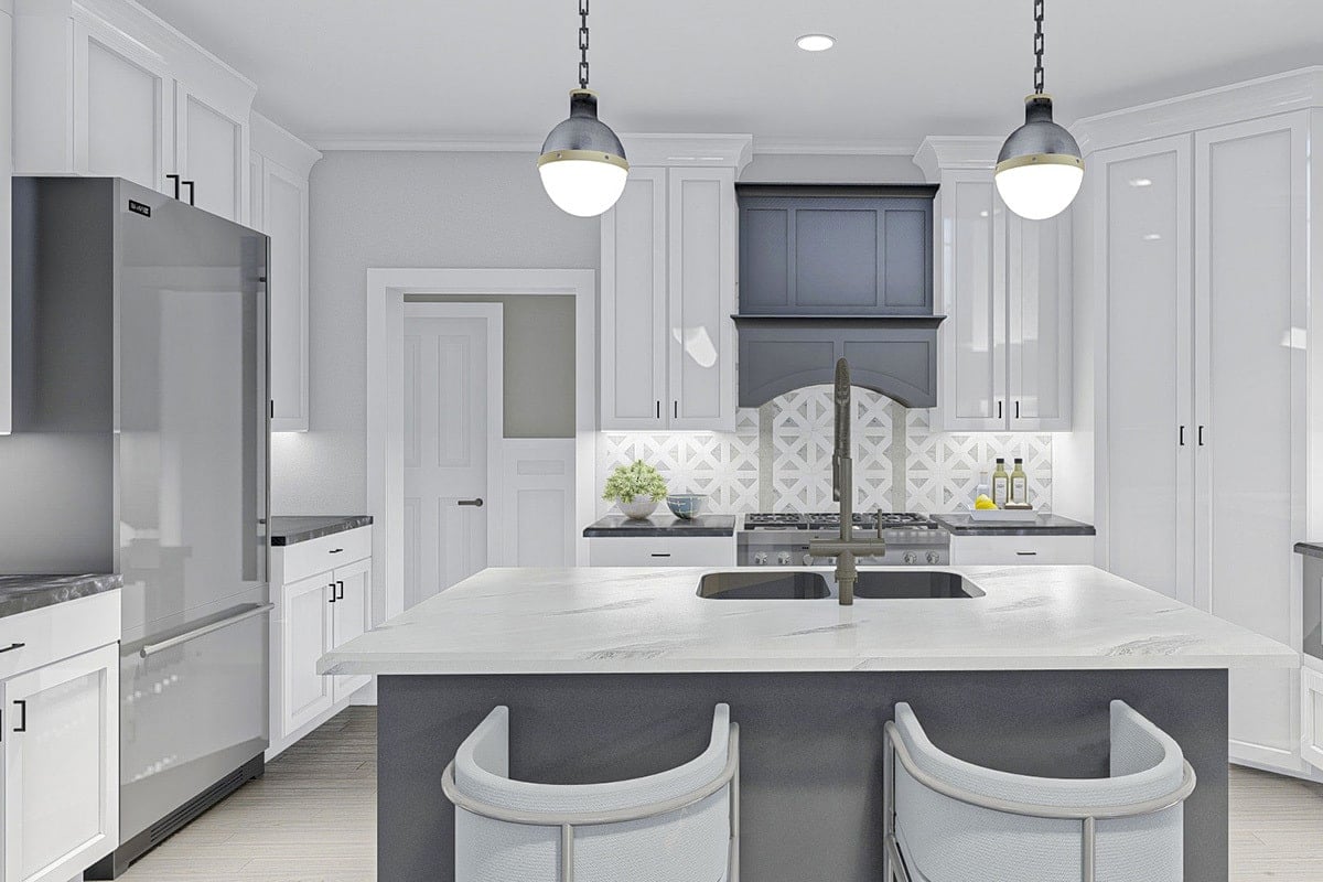 Contemporary Kitchen Features Geometric Backsplash and Island Lighting
