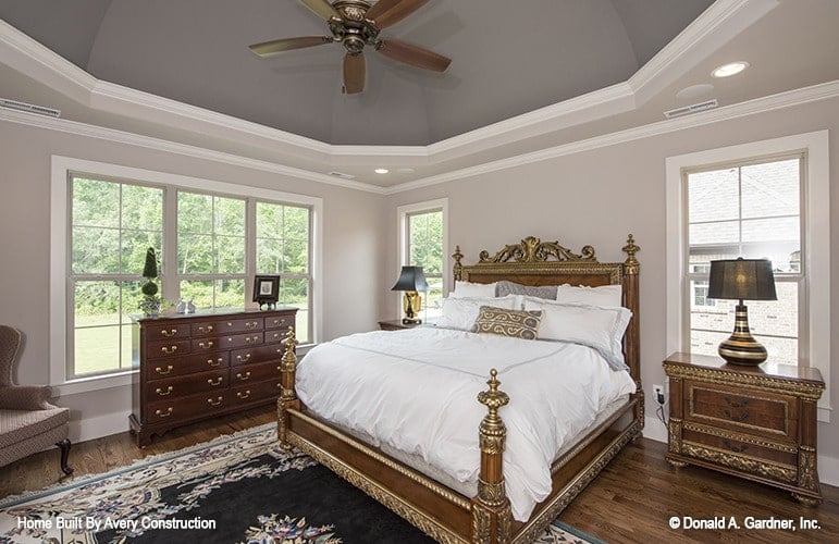 Elegant Bedroom with Ornate Wooden Accents