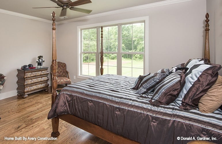 Spacious Bedroom Showcasing Classic Wooden Elements