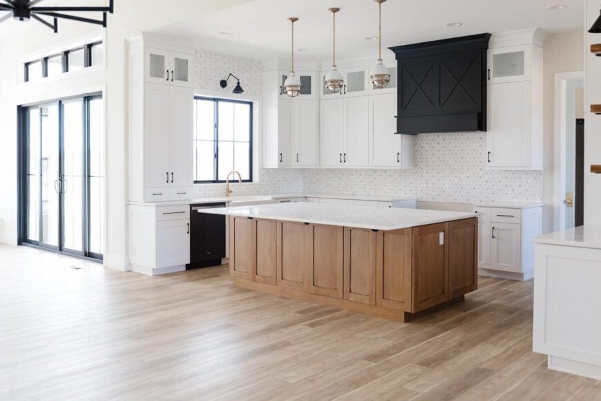 Sliding doors off the rear patio leads directly to the open living space and kitchen.