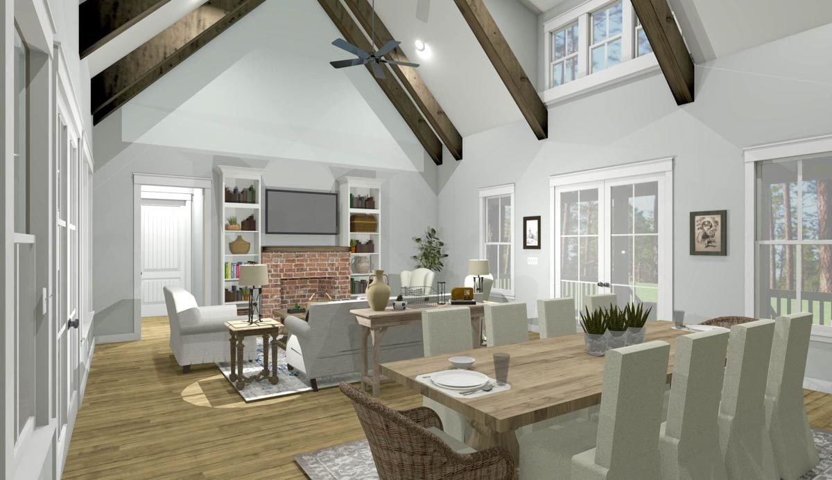 Behind the living room is the dining area with a rectangular dining table paired with skirted high back chairs, and wicker accent chairs.