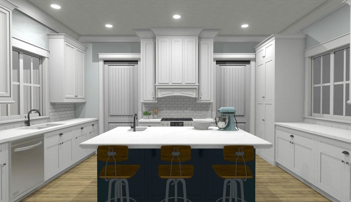 The kitchen has white cabinetry, subway tile backsplash, and a marble top breakfast island.