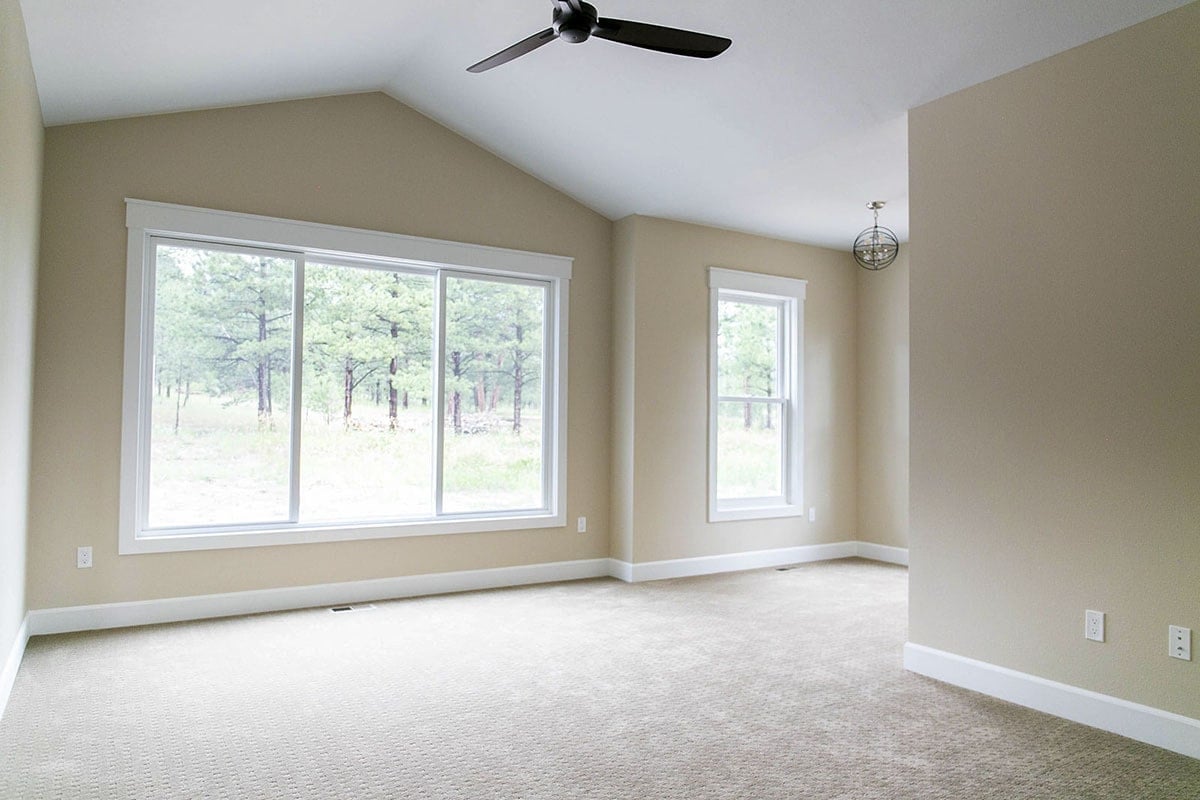 Spacious Room with Abundant Light and Green Views
