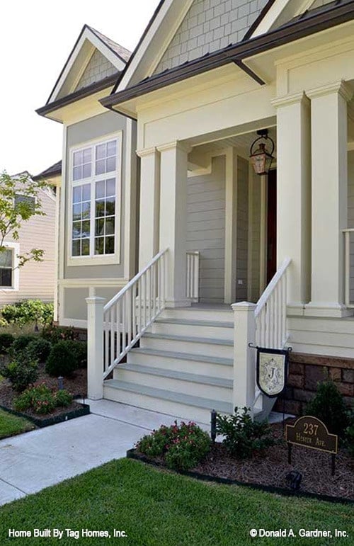Elegant Porch Design with Lantern Accents and Florals